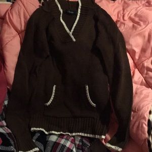 A sweatshirt with a hoodie attached for kids.